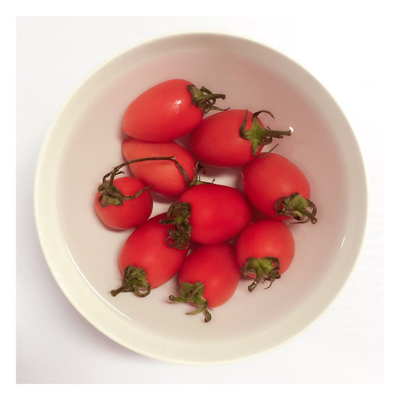 food, food and drink, healthy eating, freshness, indoors, plate, still life, vegetable, salad, table, tomato, ready-to-eat, high angle view, red, bowl, directly above, close-up, serving size, meal, healthy lifestyle