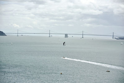 View of suspension bridge over sea