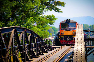 Train on railroad track against sky