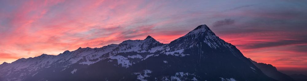 Scenic view of dramatic sky during sunset