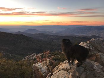 Scenic view of mountains against sky during sunset