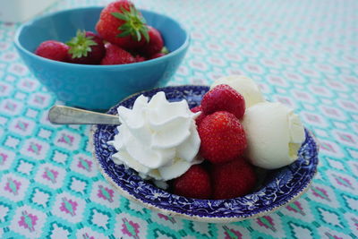 Close-up of strawberries in bowl on table