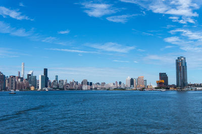 View of buildings in city at waterfront