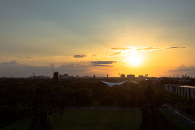 Scenic view of sunset over city