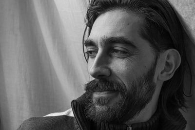 Portrait of young man looking away