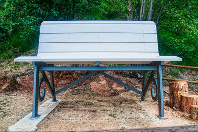 Empty bench in park