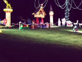 Group of people in park at night