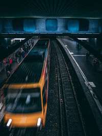 Train on railroad tracks at night