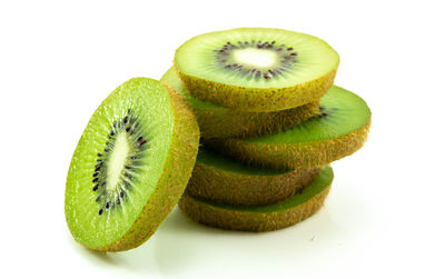 Close-up of fruits against white background