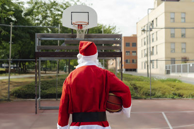 Santa claus ready to play a basketball game