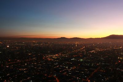 Aerial view of city at night