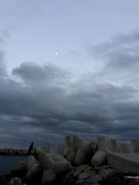 Scenic view of landscape against cloudy sky