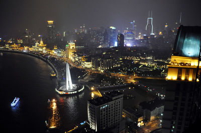 High angle view of illuminated city at night