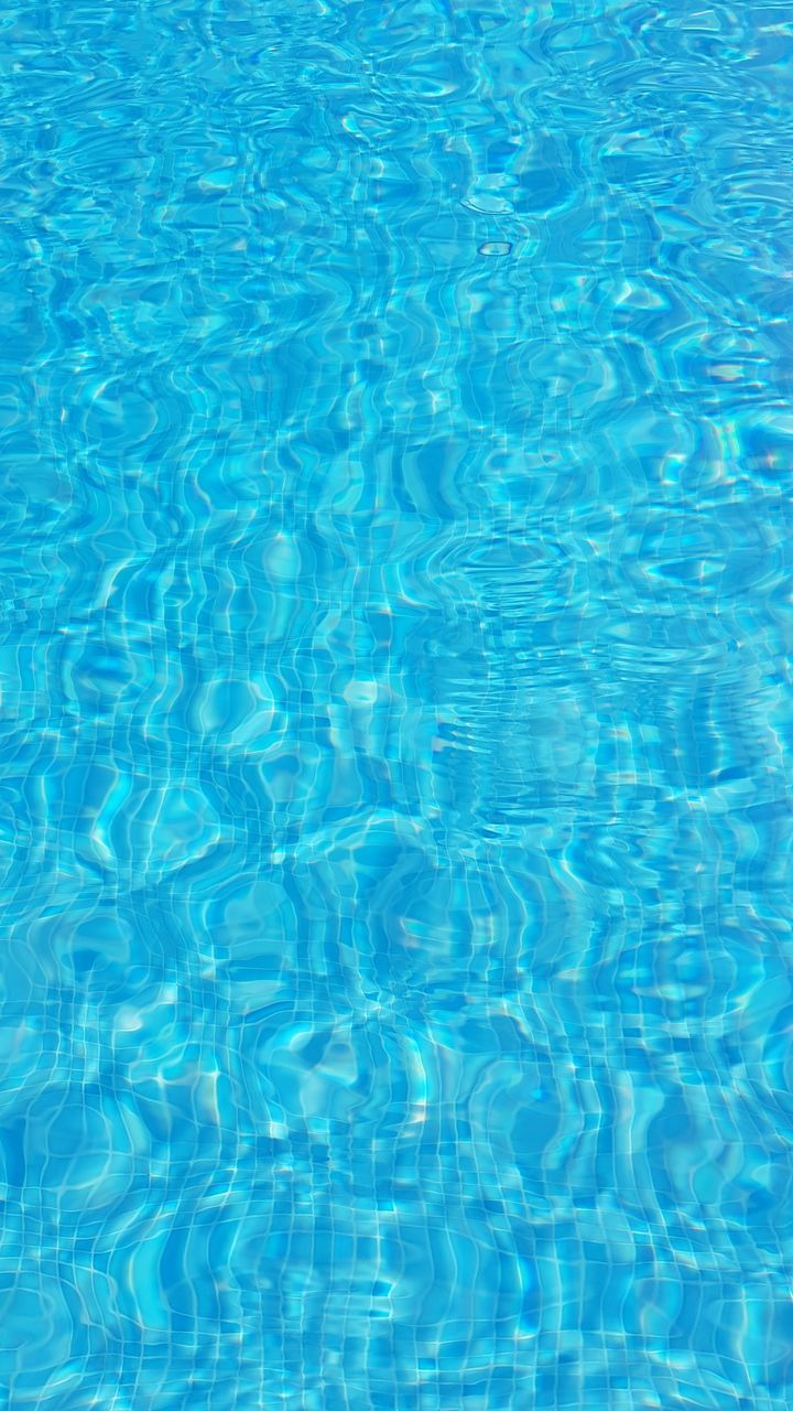 HIGH ANGLE VIEW OF SWIMMING POOL IN WATER