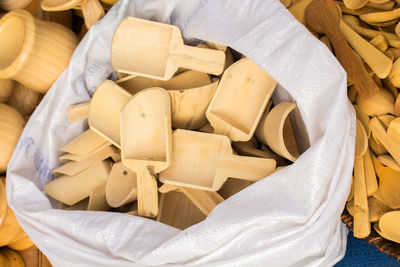 High angle view of shells on paper