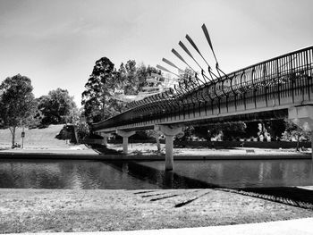 Bridge over river against sky