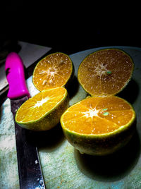 Close-up of oranges on table