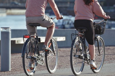 Low section of people riding bicycle