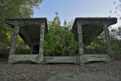 Low angle view of old ruin bridge against sky