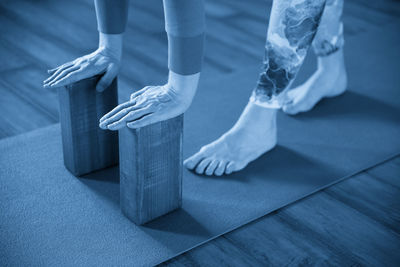 Low section of woman standing on floor