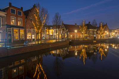 View on the city sneek with christmas in the netherlands at sunset