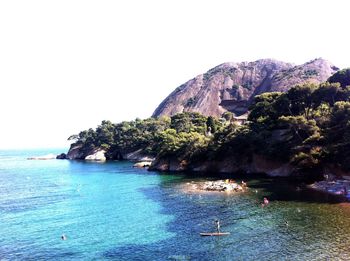 Scenic view of sea with mountains in background