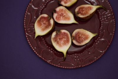 High angle view of fruits in plate on table