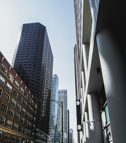 Low angle view of skyscrapers against sky