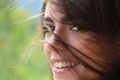 Close-up portrait of young woman outdoors