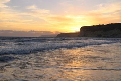 Scenic view of sea against sky during sunset