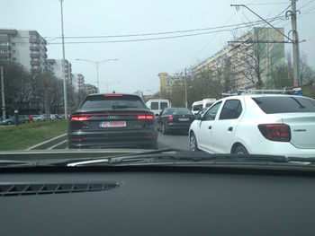 Cars on road in city