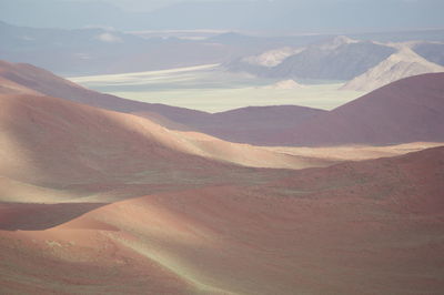 Landscape with mountain range in background