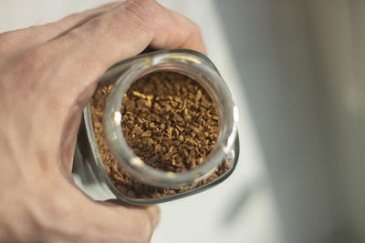 Freeze-dried coffee in a glass jar. coffee drink. granules made from coffee beans.