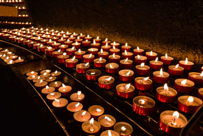 High angle view of illuminated candles