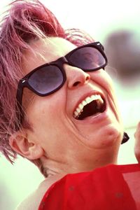 Close-up portrait of man wearing sunglasses