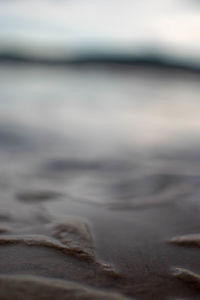 Surface level of sea against sky