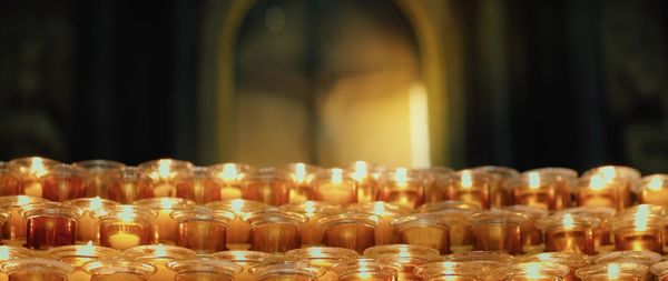 Close-up of illuminated candles