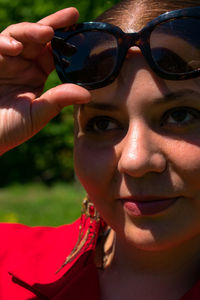 Close-up of smiling woman looking away