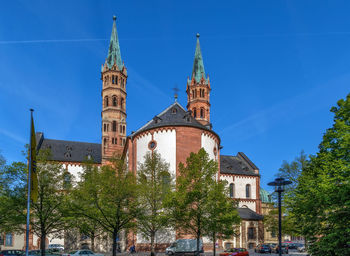 Low angle view of building against blue sky