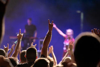 Group of people at music concert