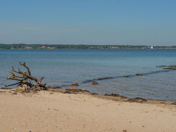 Scenic view of sea against clear sky