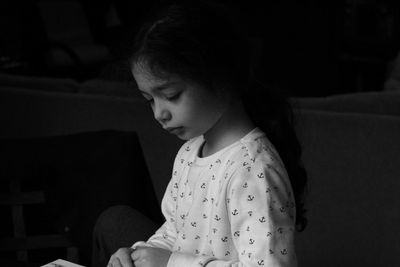 Close-up of upset girl at home