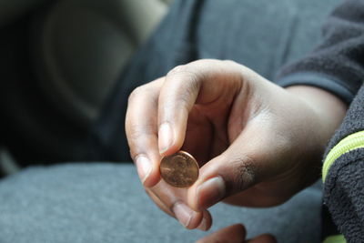 Close-up of hand holding hands