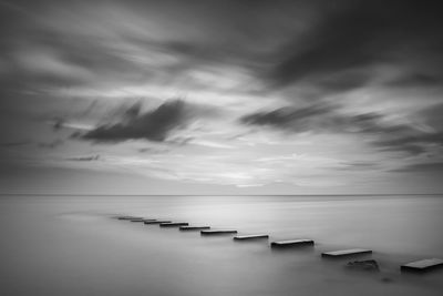 View of stepping stones in sea