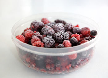 Close-up of strawberries in bowl on table