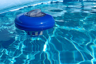 High angle view of cleaner in swimming pool