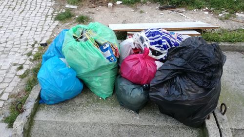 High angle view of garbage on sidewalk