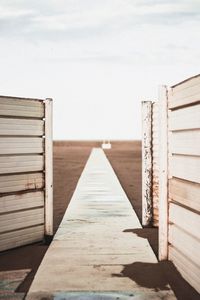 Pier over sea against sky