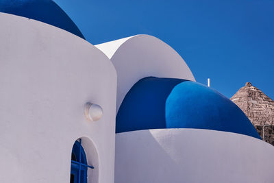 Details of the saint nikolaos holy convent with its blue dome - santorini, greece