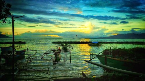 Scenic view of lake against cloudy sky